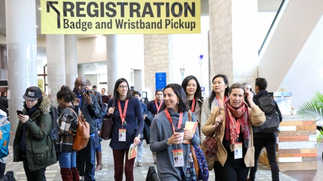 SXSW EDU 2019 Attendees picking up registration badge.