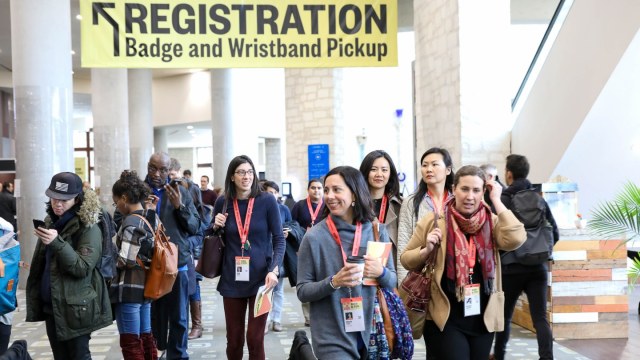 SXSW EDU 2019 Attendees picking up registration badge.